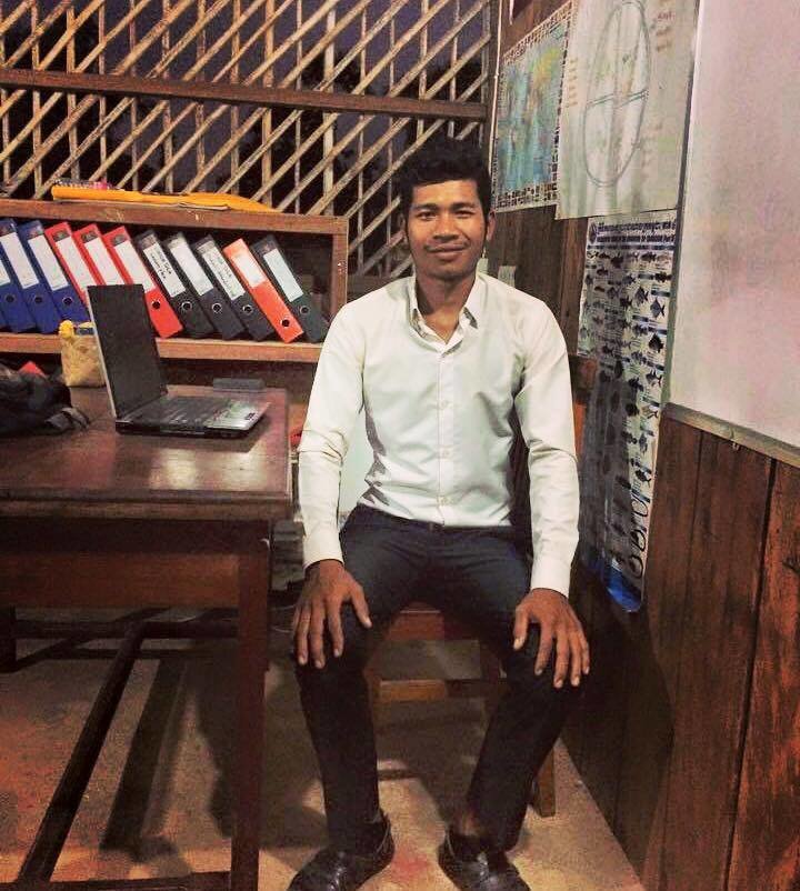 EDGE Cambodia educational charity — local educator and mentoring programme A local Cambodian educator at his desk, part of the teaching team EDGE Worldwide supports