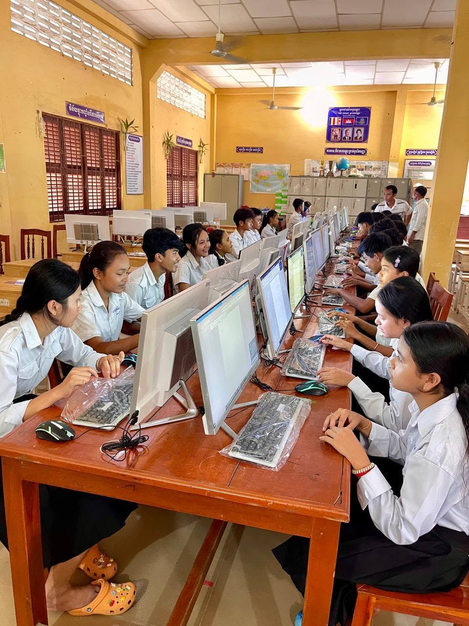 Students seated in rows at computers in the IT lab